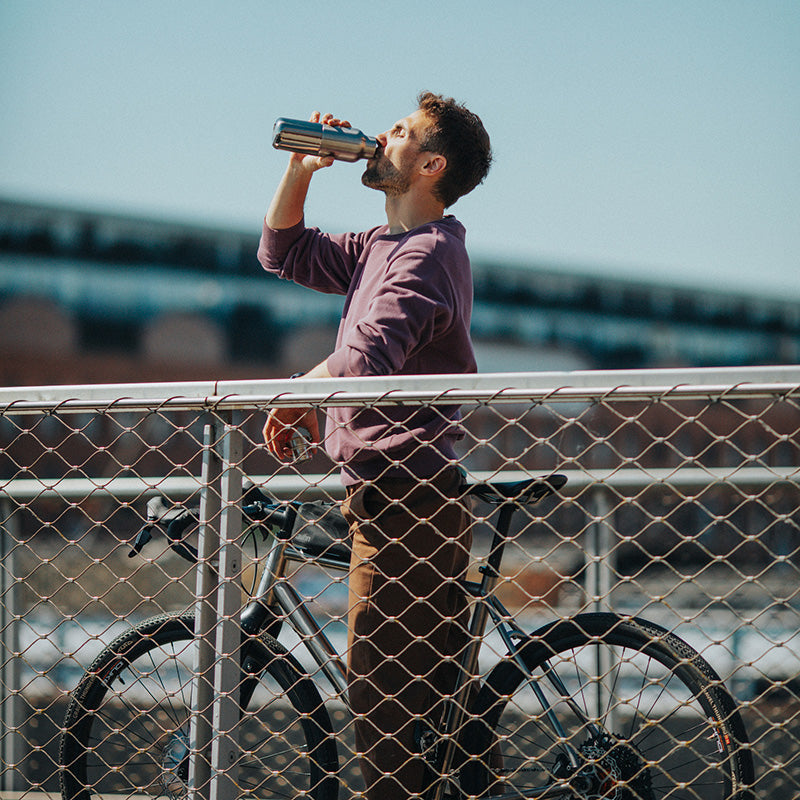 12oz-rise-reflect-with-bamboo-cap-n5 16oz_rise_reflect_man_bike_square.jpg