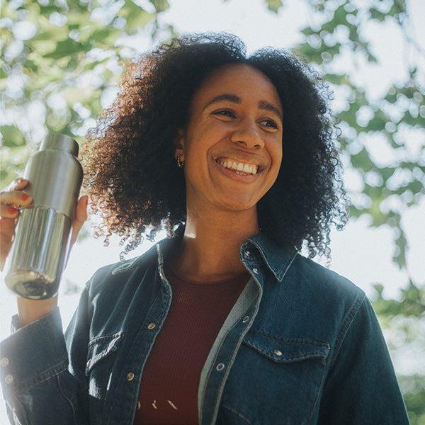 bring-your-own-party-kit-tumblers-and-cocktails-b6 16oz_rise_reflect_woman_smile_square.jpg