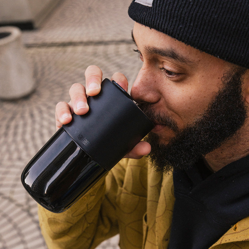 16oz-rise-tumbler-n2 16oz_rise_tumbler_black_man_drink_square.jpg