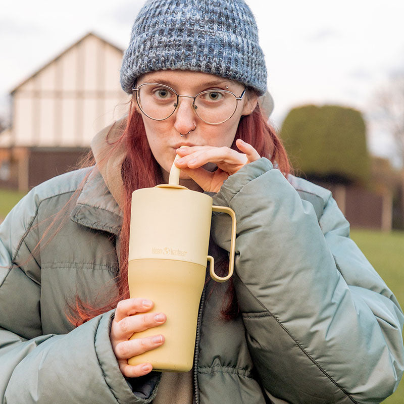 26oz-rise-tumbler-with-straw-lid-u7 26oz_rise_rumbler_straw_wax_yellow_woman_sip_square.jpg