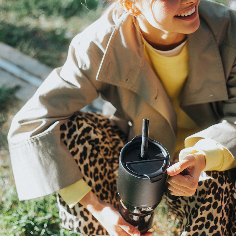 26oz-rise-tumbler-with-straw-lid-u7 26oz_rise_tumbler_black_woman_topview_square.jpg