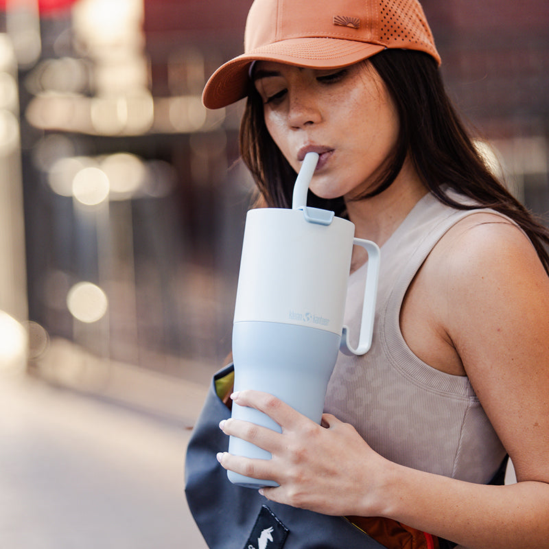 36oz-rise-tumbler-with-straw-lid-c4 36oz_rise_tumbler_straw_girl_sip_square.jpg
