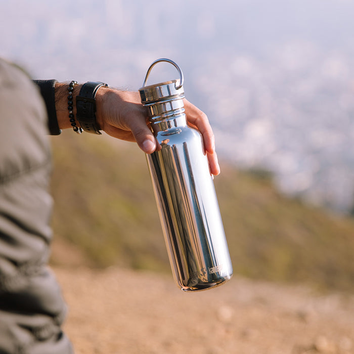 27oz-reflect-with-bamboo-cap-b4 K27SSLRF-MS-BAMBOO_reflect_bottle_hand_lifestyle.jpg
