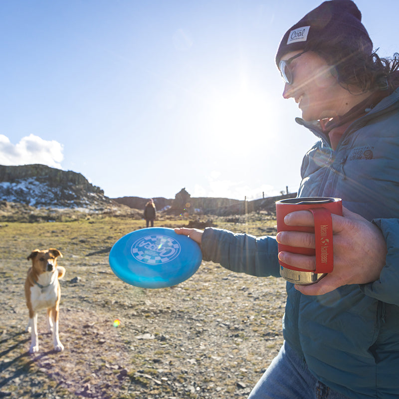 12oz-camp-mug-r8 insulated_camp_mug_12oz_woman_dog_frisbee_square.jpg