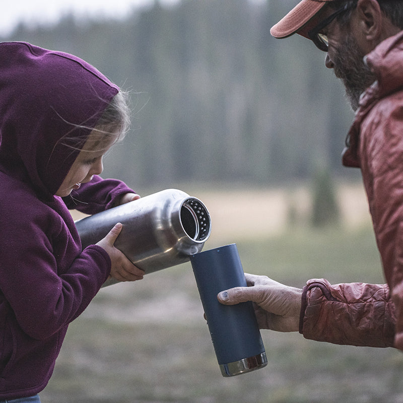 64oz-tkwide-with-loop-cap-m0 tkwide_64oz_bottle_girl_dad_filling_square.jpg